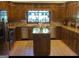 Kitchen features granite countertops and ample cabinetry at 7866 Hwy 54, Sharpsburg, GA 30277