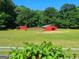 Two-stall barn with a large paddock, perfect for horses at 7866 Hwy 54, Sharpsburg, GA 30277