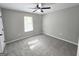 Bright bedroom with ceiling fan and carpet flooring at 260 Pleasant Valley Rd, Mcdonough, GA 30253