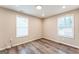 Bright bedroom with wood-look floors and neutral walls at 1872 Oakmont Nw Dr, Atlanta, GA 30314