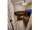 Cozy living room with brown sofas and wood-look flooring at 2628 Haligan Pointe, Riverdale, GA 30296