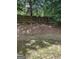 Private backyard with wooden fence and grassy area at 2628 Haligan Pointe, Riverdale, GA 30296