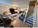 Spacious living room with fireplace and hardwood floors at 2628 Haligan Pointe, Riverdale, GA 30296