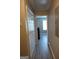 Hallway with double door closet and wood-look flooring at 2628 Haligan Pointe, Riverdale, GA 30296