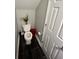 Small half-bathroom with dark tile floor and white vanity at 2628 Haligan Pointe, Riverdale, GA 30296