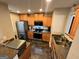 Modern kitchen with stainless steel appliances and granite counters at 2628 Haligan Pointe, Riverdale, GA 30296