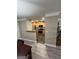 Open kitchen with granite countertops and wood cabinets at 2628 Haligan Pointe, Riverdale, GA 30296