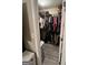 Walk-in closet with ample shelving and hanging space at 2628 Haligan Pointe, Riverdale, GA 30296