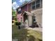 Townhouse exterior with private patio and grill area at 2628 Haligan Pointe, Riverdale, GA 30296