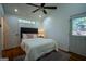 Cozy bedroom with a queen-size bed and large window at 4130 Middlebrooks Ne St, Covington, GA 30014