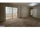 Living room with sliding doors leading to a sunroom at 1904 Caribaea Se Trl, Atlanta, GA 30316