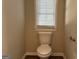 Small half bathroom with updated fixtures at 1904 Caribaea Se Trl, Atlanta, GA 30316