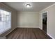 Simple dining room with hardwood floors and window at 1904 Caribaea Se Trl, Atlanta, GA 30316