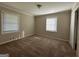 Spacious bedroom with neutral walls and carpet at 1904 Caribaea Se Trl, Atlanta, GA 30316