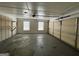 Attached garage with shelving and overhead door at 1904 Caribaea Se Trl, Atlanta, GA 30316