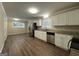 Kitchen with white cabinets and granite counters at 1904 Caribaea Se Trl, Atlanta, GA 30316
