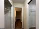 Hallway with two closets and wood flooring at 1904 Caribaea Se Trl, Atlanta, GA 30316