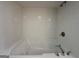 Bathroom with a large corner bathtub at 1904 Caribaea Se Trl, Atlanta, GA 30316