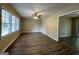 Bright living room with vinyl flooring and ceiling fan at 1581 Hollyhock Ter, Decatur, GA 30032