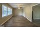 Bright living room featuring hardwood floors and a ceiling fan at 1581 Hollyhock Ter, Decatur, GA 30032