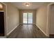 Spacious dining area with sliding glass doors leading to the backyard at 1581 Hollyhock Ter, Decatur, GA 30032