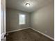 Cozy bedroom with neutral walls and carpet flooring at 2019 W Flat Shoals Ter, Decatur, GA 30034