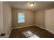 Bright bedroom with neutral walls and carpet flooring at 2019 W Flat Shoals Ter, Decatur, GA 30034