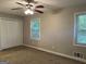 Spacious bedroom with double closets and ceiling fan at 2019 W Flat Shoals Ter, Decatur, GA 30034
