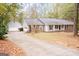 Ranch-style home with a brick facade and attached garage at 130 Greenridge Ct, Fayetteville, GA 30215