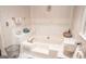 Relaxing bathroom with soaking tub and tile surround at 130 Greenridge Ct, Fayetteville, GA 30215