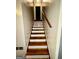 View of staircase leading to upper level of home at 6091 Katherine Rd, Rex, GA 30273