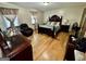 Main bedroom with hardwood floors and large bed at 6091 Katherine Rd, Rex, GA 30273