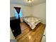 Bedroom with hardwood floors and a double bed at 6091 Katherine Rd, Rex, GA 30273