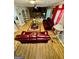 Spacious living room with hardwood floors and fireplace at 6091 Katherine Rd, Rex, GA 30273