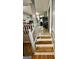 View of staircase leading to the upper level of the home at 6091 Katherine Rd, Rex, GA 30273