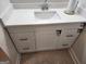 Bathroom vanity with white countertop and drawers at 7595 Teton Ct, Jonesboro, GA 30236