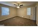 Bedroom with ceiling fan and neutral decor at 3617 Collins Dr, Douglasville, GA 30135