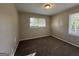 Well-lit bedroom featuring carpet and windows at 3617 Collins Dr, Douglasville, GA 30135