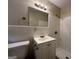 Bathroom with white vanity and shower/tub combo at 3617 Collins Dr, Douglasville, GA 30135