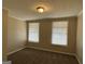 Spacious bedroom with neutral walls and carpeting at 3617 Collins Dr, Douglasville, GA 30135