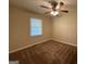 Bedroom with carpet flooring and ceiling fan at 4778 Glenwood Rd, Decatur, GA 30035