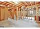 Unfinished basement with exposed framing and subflooring at 115 Bernhard Rd, Fayetteville, GA 30215
