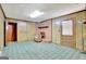 Gathering room with brick fireplace and wood paneling at 115 Bernhard Rd, Fayetteville, GA 30215