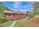 Brick house with ramp access and a walkway at 115 Bernhard Rd, Fayetteville, GA 30215