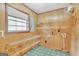 Laundry room offering wire shelving and a window for natural light at 115 Bernhard Rd, Fayetteville, GA 30215