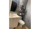 Simple bathroom with white vanity, toilet, and shower/tub combo at 2893 Franklin Rd, Lawrenceville, GA 30044