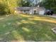 Charming single-story home with attached garage and large front yard at 2893 Franklin Rd, Lawrenceville, GA 30044