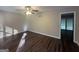 Spacious bedroom with dark hardwood floors and sliding glass doors at 3850 Bright Star Rd, Douglasville, GA 30135