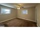 Bedroom with neutral walls, carpet, and ceiling fan at 3850 Bright Star Rd, Douglasville, GA 30135