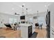 Open concept kitchen boasts modern appliances and island at 2147 Mcafee Rd, Decatur, GA 30032